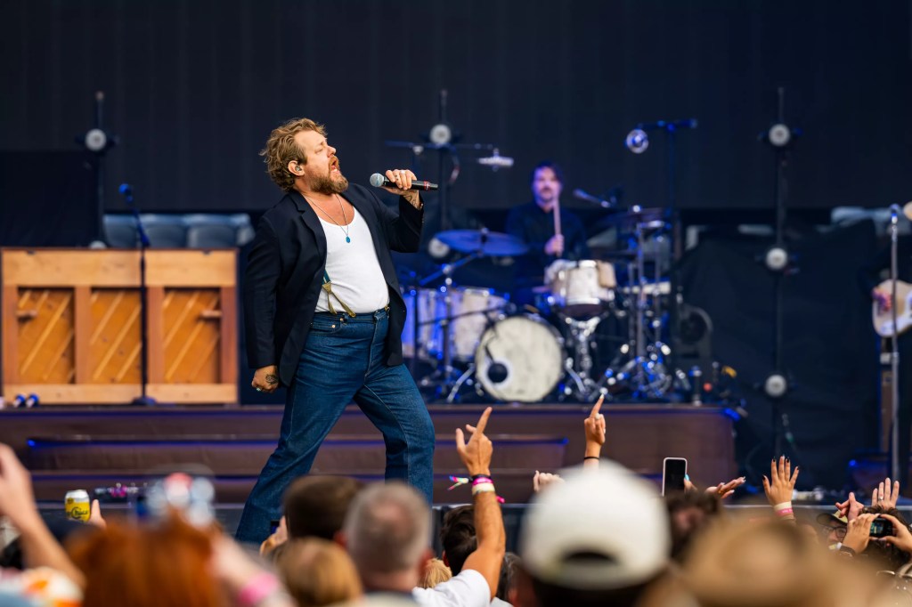 Nathaniel Rateliff on stage at Empower Field