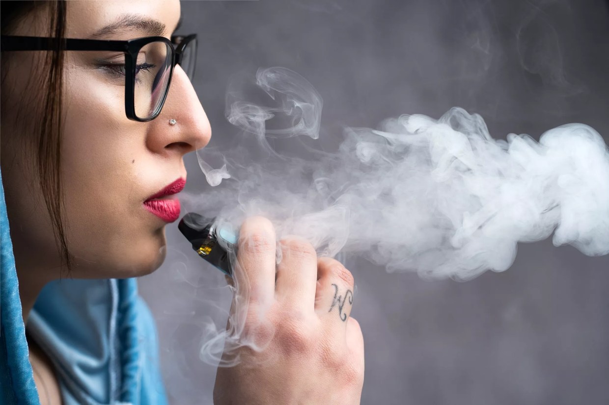 A woman vaping